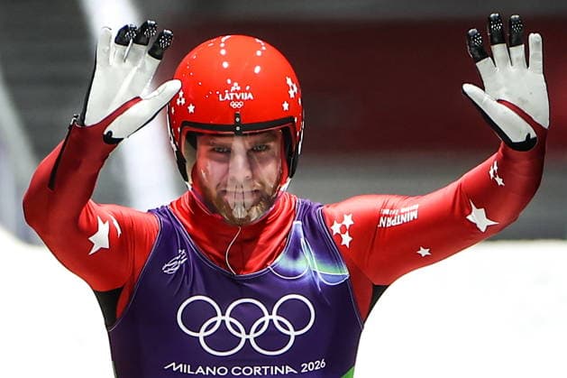 ITALY - FEBRUARY 8, 2026: Kristers Aparjods of Latvia competes in Run 4 of the men s singles luge event at Cortina Sliding Centre in Cortina dâ€™Ampezzo during the 2026 Winter Olympic Games, Olympische Spiele, Olympia, OS Peter Kovalev TASS  88399175