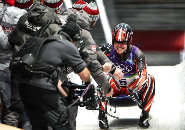 ITALY - FEBRUARY 8, 2026: Jonas Mueller of Austria celebrates winning silver in Run 4 of the men s singles luge event at Cortina Sliding Centre in Cortina dâ€™Ampezzo during the 2026 Winter Olympic Games, Olympische Spiele, Olympia, OS Peter Kovalev TASS  88399510
