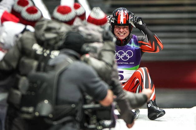 ITALY, CORTINA Dâ€™AMPEZZO - FEBRUARY 8, 2026: Jonas Mueller of Austria celebrates winning silver in the men s singles luge event at Cortina Sliding Centre during the 2026 Winter Olympic Games, Olympische Spiele, Olympia, OS Peter Kovalev TASS  88400254