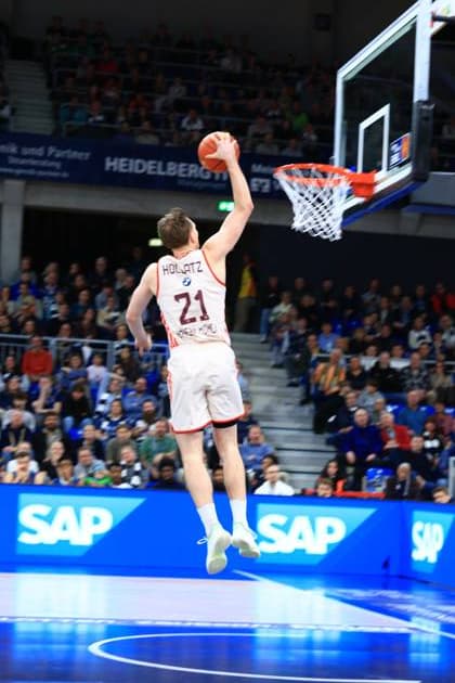 Game action with Justus Hollatz 21 FC Bayern Basketball at the basket easyCredit BBL MLP Academics Heidelberg - FC Bayern München Basketball 08 02 2026 Copyright: xMichaelxGelhardtx