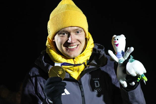 ITALY, CORTINA Dâ€™AMPEZZO - FEBRUARY 8, 2026: Gold medalist Max Langenhan of Germany poses at an award ceremony for the men s singles luge event at Cortina Sliding Centre during the 2026 Winter Olympic Games, Olympische Spiele, Olympia, OS Peter Kovalev TASS  88400536