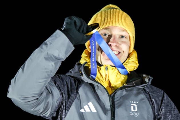 ITALY, CORTINA Dâ€™AMPEZZO - FEBRUARY 8, 2026: Gold medalist Max Langenhan of Germany poses at an award ceremony for the men s singles luge event at Cortina Sliding Centre during the 2026 Winter Olympic Games, Olympische Spiele, Olympia, OS Peter Kovalev TASS  88400690