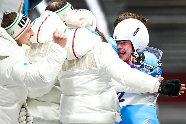 ITALY, CORTINA Dâ€™AMPEZZO - FEBRUARY 8, 2026: Dominik Fischnaller (R) of Italy celebrates winning bronze in the men s singles luge event at Cortina Sliding Centre during the 2026 Winter Olympic Games, Olympische Spiele, Olympia, OS Peter Kovalev TASS  88401028