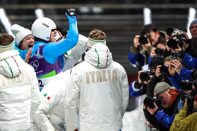 ITALY, CORTINA Dâ€™AMPEZZO - FEBRUARY 8, 2026: Dominik Fischnaller (2nd L) of Italy celebrates winning bronze in the men s singles luge event at Cortina Sliding Centre during the 2026 Winter Olympic Games, Olympische Spiele, Olympia, OS Peter Kovalev TASS  88401126