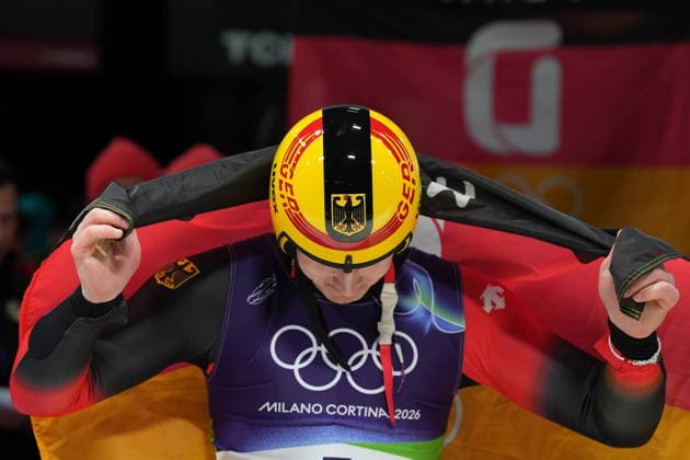 Germany s Max Langenhan celebrates winning the gold medal as he arrives at the finish during a men s single luge run at the 2026 Winter Olympics, in Cortina d Ampezzo, Italy, Sunday, Feb. 8, 2026 (Spada LaPresse)  Copyright: xSpada LaPressex