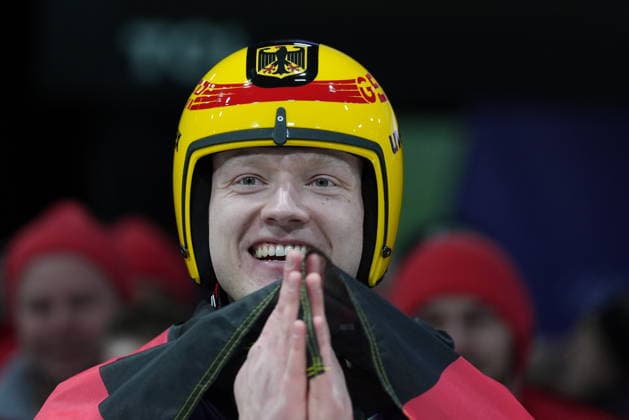 Germany s Max Langenhan celebrates winning the gold medal as he arrives at the finish during a men s single luge run at the 2026 Winter Olympics, in Cortina d Ampezzo, Italy, Sunday, Feb. 8, 2026 (Spada LaPresse)  Copyright: xSpada LaPressex