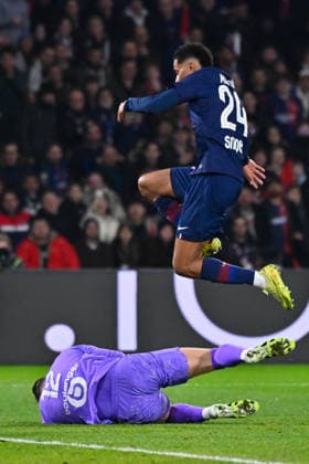 FOOTBALL : PSG vs Marseille - Ligue1 - 08 02 2026 Senny Mayulu ( 24 - PSG ) and Jeffrey De Lange ( 12 - Olympique Marseille ) during the Ligue 1 match between Paris Saint Germain and Olympique Marseille at Parc Des Princes on February 08 , 2026 in Paris, France. ( Photo by Federico Pestelini PsnewZ ) - ParisFrance  Copyright: xFedericoxPestelinix