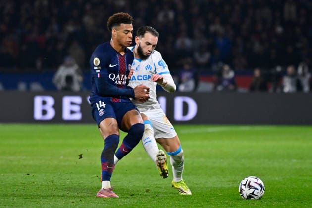 FOOTBALL : PSG vs Marseille - Ligue1 - 08 02 2026 Desire Doue ( 14 - PSG ) and Amine Gouiri ( 9 - Olympique Marseille ) during the Ligue 1 match between Paris Saint Germain and Olympique Marseille at Parc Des Princes on February 08 , 2026 in Paris, France. ( Photo by Federico Pestelini PsnewZ ) - ParisFrance  Copyright: xFedericoxPestelinix
