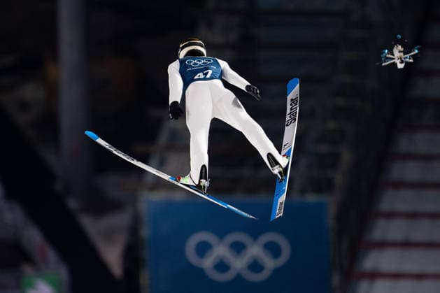 OLYMPICS - Winter Olympic Games, Olympische Spiele, Olympia, OS Milano Cortina 2026 VAL DI FIEMME,ITALY,08.FEB.26 - OLYMPICS, Ski jumping, Skispringen, Ski, nordisch - Winter Olympic Games Milano Cortina 2026, normal hill, men, training. Image shows Anze Lanisek (SLO) and a drone.  GEPAxpictures xOliverxLerch