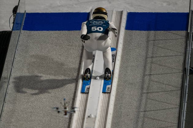 OLYMPICS - Winter Olympic Games, Olympische Spiele, Olympia, OS Milano Cortina 2026 VAL DI FIEMME,ITALY,08.FEB.26 - OLYMPICS, Ski jumping, Skispringen, Ski, nordisch - Winter Olympic Games Milano Cortina 2026, normal hill, men, training. Image shows Domen Prevc (SLO) and a drone.  GEPAxpictures xOliverxLerch
