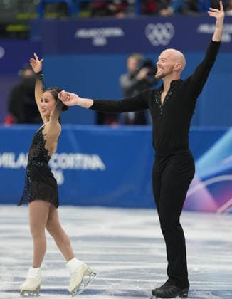 (260208) -- MILAN, Feb. 8, 2026 -- Ellie Kam (L) Danny O Shea of the United States react after their performance during the Figure skating, Eiskunstlauf team event pair skating free skating of the Milan-Cortina 2026 Olympic Winter games, Winterspiele,Spiele, Summer games in Milan, Italy, Feb. 8, 2026. ) (MICO2026)ITALY-MILAN-OLYMPIC WINTER GAMES-FIGURE SKATING TEAM EVENT-PAIR SKATING-FREE SKATING XuexYuge 