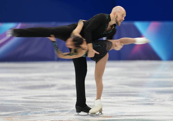 (260208) -- MILAN, Feb. 8, 2026 -- Ellie Kam (R) Danny O Shea of the United States perform during the Figure skating, Eiskunstlauf team event pair skating free skating of the Milan-Cortina 2026 Olympic Winter games, Winterspiele,Spiele, Summer games in Milan, Italy, Feb. 8, 2026. ) (MICO2026)ITALY-MILAN-OLYMPIC WINTER GAMES-FIGURE SKATING TEAM EVENT-PAIR SKATING-FREE SKATING XuexYuge 