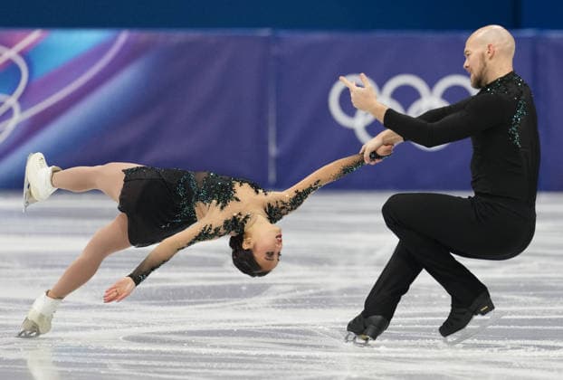 (260208) -- MILAN, Feb. 8, 2026 -- Ellie Kam (L) Danny O Shea of the United States perform during the Figure skating, Eiskunstlauf team event pair skating free skating of the Milan-Cortina 2026 Olympic Winter games, Winterspiele,Spiele, Summer games in Milan, Italy, Feb. 8, 2026. ) (MICO2026)ITALY-MILAN-OLYMPIC WINTER GAMES-FIGURE SKATING TEAM EVENT-PAIR SKATING-FREE SKATING XuexYuge 