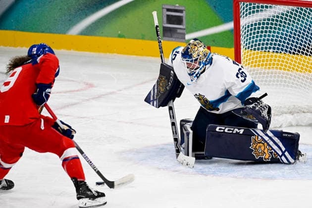 LKS 20260208 Czech s Natalie Mlynkova (L) and Finland s goalie Anni Keisala during the Team Finland women s icehockey preliminary round Group A match Czech Republic vs. Finland at the Milano Cortina Winter Olympics in Milan on February 8, 2026. - EMMI KORHONEN Milano Italy d1qoW_eprmw  Copyright: xEmmixKorhonenx d1qoW_eprmw