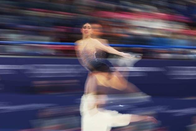(260208) -- MILAN, Feb. 8, 2026 -- Sara Conti (top) Niccolo Macii of Italy compete during the free skating of pair skating for Figure skating, Eiskunstlauf team event at the Milan-Cortina 2026 Olympic Winter games, Winterspiele,Spiele, Summer games in Milan, Italy, Feb. 8, 2026. ) (MICO2026)ITALY-MILAN-OLYMPIC WINTER GAMES-FIGURE SKATING TEAM EVENT-PAIRING SKATING LixMing 