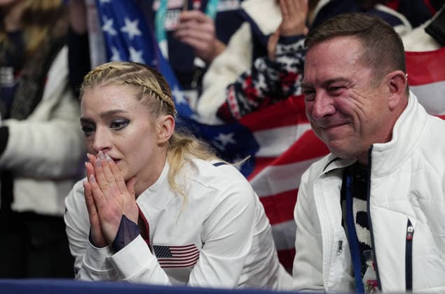 (260208) -- MILAN, Feb. 8, 2026 -- Amber Glenn (L) of the United States reacts after her performance during the Figure skating, Eiskunstlauf team event women single skating free skating of the Milan-Cortina 2026 Olympic Winter games, Winterspiele,Spiele, Summer games in Milan, Italy, Feb. 8, 2026. ) (MICO2026)ITALY-MILAN-OLYMPIC WINTER GAMES-FIGURE SKATING TEAM EVENT-WOMEN SINGLE SKATING-FREE SKATING XuexYuge 