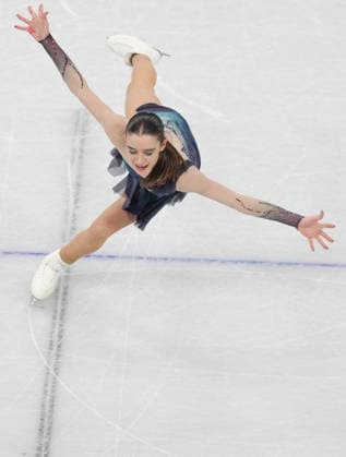 (260208) -- MILAN, Feb. 8, 2026 -- Lara Naki Gutmann of Italy competes during the Figure skating, Eiskunstlauf team event women single skating free skating of the Milan-Cortina 2026 Olympic Winter games, Winterspiele,Spiele, Summer games in Milan, Italy, Feb. 8, 2026. ) (MICO2026)ITALY-MILAN-OLYMPIC WINTER GAMES-FIGURE SKATING TEAM EVENT-WOMEN SINGLE SKATING-FREE SKATING ChengxMin 