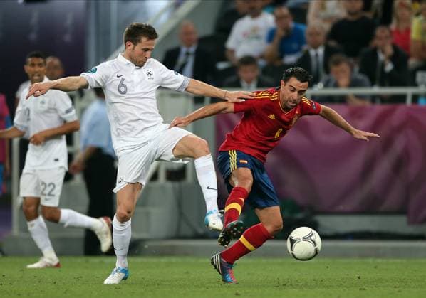 Spain V France, UEFA EURO, EM, Europameisterschaft,Fussball 2012 Quarter Final Yohan Cabaye of France and Xavi Hernandez of Spain challenge during the UEFA Euro 2012 Quarter Final match between Spain and France at Donbass Arena on June 23, 2012 in Donetsk, Ukraine. Donetsk Donbass Arena Ukraine Ukraine Copyright: xAllstarxPicturexLibraryxLtdx