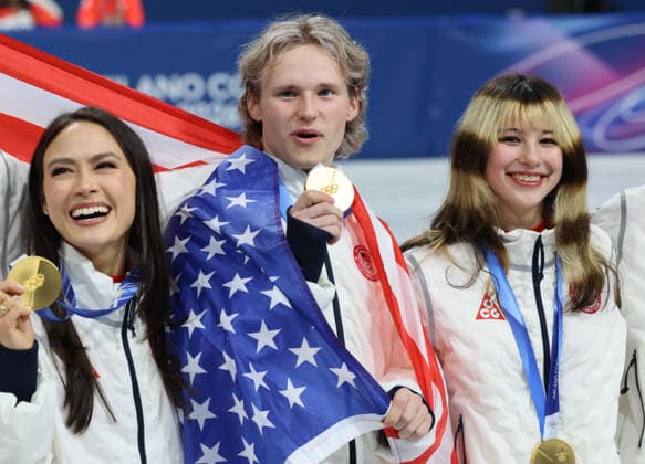 February 8, 2026, Milan, Lombardy, Italy: MADISON CHOCK, ILIA MALININ and ALYSA LIU of Team USA celebrate wiith their gold medal during the Victory Ceremony of the Figure skating, Eiskunstlauf Team Event at the Milano Cortina 2026 Winter Olympic Games, Olympische Spiele, Olympia, OS Olympics 2026: Milano Cortina: Figure Skating Team Event  - ZUMAc179 20260208_oly_c179_086 Copyright: xMickaelxChavetx