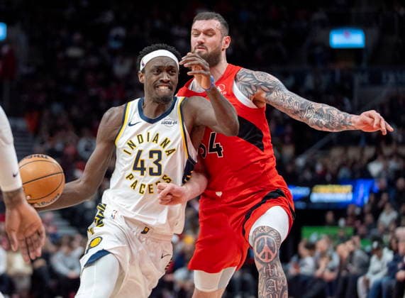 February 8, 2026, Toronto, On, Canada: Indiana Pacers forward Pascal Siakam (43) drives past Toronto Raptors forward Sandro Mamukalashvili (54) during first half NBA, Basketball Herren, USA action in Toronto on Sunday Feb. 8, 2026. Canada News - February 8, 2026  - ZUMAc35_ 20260208_zaf_c35_199 Copyright: xFrankxGunnx