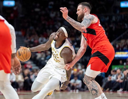 February 8, 2026, Toronto, On, Canada: Indiana Pacers forward Pascal Siakam (43) drives past Toronto Raptors forward Sandro Mamukalashvili (54) during first half NBA, Basketball Herren, USA action in Toronto on Sunday Feb. 8, 2026. Canada News - February 8, 2026  - ZUMAc35_ 20260208_zaf_c35_201 Copyright: xFrankxGunnx