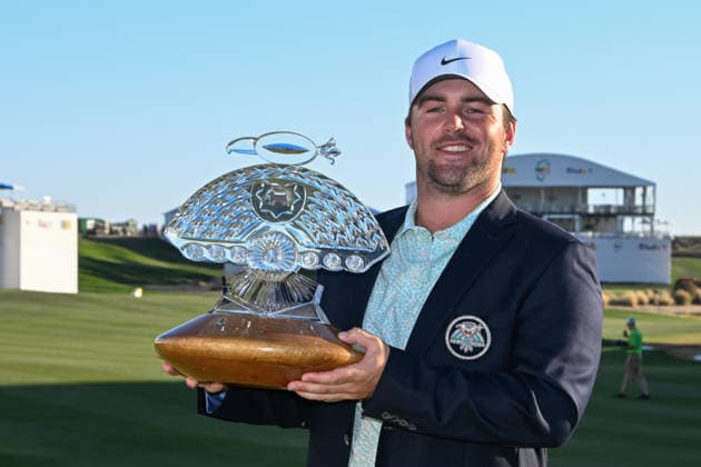 SCOTTSDALE, AZ - FEBRUARY 08: Chris Gotterup (USA) holds the trophy for winning the Waste Management Phoenix Open on February 8, 2026, at TPC Scottsdale, Scottsdale, Arizona. (Photo by Ken Murray Icon Sportswire) GOLF: FEB 08 PGA, Golf Herren WM Phoenix Open EDITORIAL USE ONLY Icon2602080184