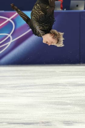 February 8, 2026, Milan, Lombardy, Italy: ILIA MALININ of Team USA executes a backflip in the Men s Single Skating Free Program of the Figure skating, Eiskunstlauf Team Event at the Milano Cortina 2026 Winter Olympic Games, Olympische Spiele, Olympia, OS Olympics 2026: Milano Cortina: Figure Skating Team Event  - ZUMAc179 20260208_oly_c179_215 Copyright: xMickaelxChavetx