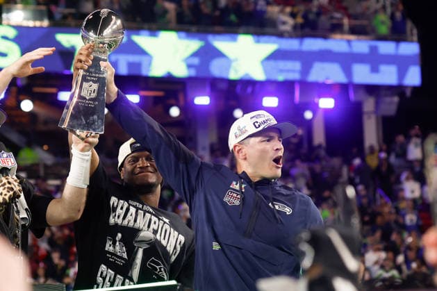 Seattle Seahawks head coach Mike MacDonald holds the Vince Lombardi Trophy after the Seattle Seahawks defeated the New England Patriots to win Super Bowl LX at Levi s Stadium in Santa Clara, California on Sunday, February 8, 2026.  SBP20260208225 JOHNxANGELILLO