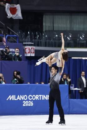 Milan Cortina Olympics: Figure skating, Eiskunstlauf Riku Miura (top) and Ryuichi Kihara of Japan pose at the conclusion of the pairs free program during the figure skating team event at the Milan Cortina Olympics at Milano Ice Skating Arena in Milan on Feb. 8, 2026.  A14AA0005258483P