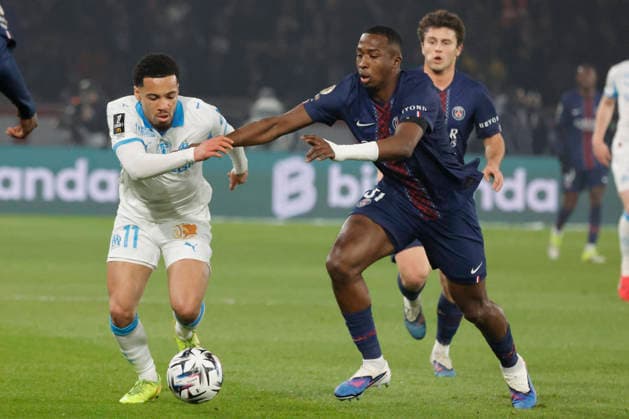 French League One - PSG vs OM PSG’s Joao Neves and Willian Pacho battles OM’s Ethan Nwaneri during the 2025-26 French soccer League One game, PSG vs OM in Parc des Princes Stadium, Paris, France on February 8th 2026. Photo by Henri Szwarc ABACAPRESS.COM Paris France  Copyright: xSzwarcxHenri ABACAx