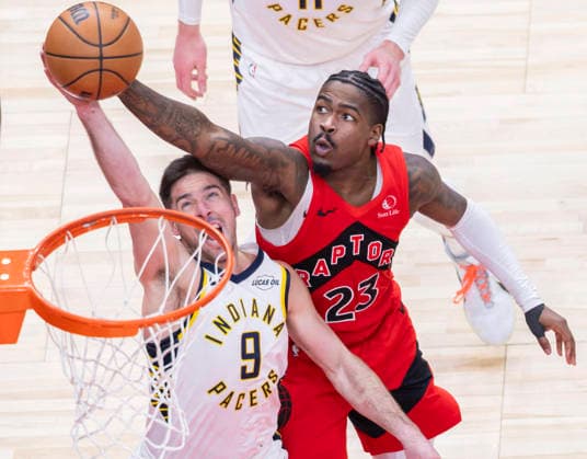 (260209) -- TORONTO, Feb. 9, 2026 -- Jamal Shead (R) of Toronto Raptors fights for a rebound with T. J. McConnell of Indiana Pacers during the 2025-2026 NBA, Basketball Herren, USA regular season game between Toronto Raptors and Indiana Pacers in Toronto, Canada, on Feb. 8, 2026. (Photo by Xinhua) (SP) CANADA-TORONTO-BASKETBALL-NBA-PACERS VS RAPTORS ZouxZheng 