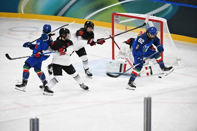 FIght in the defense zone of Japan during Ice hockey, Eishockey Olympic Winter games, Winterspiele,Spiele, Summer games Milano-Cortina 2026 in Milano, Italy, February 09 2026  Copyright: xFilippoxTomasi IPAxSportx xipa-agency.netx xx IPA_71176324 IPA_Agency_IPA71176324