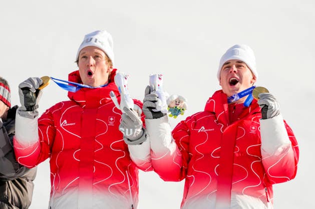 Winter Olympics in Milan Cortina 2026 Bormio, Italy 20260209. Gold medalist Franjo von Allmen and Tanguy Nef from Switzerland on the podium after the men s alpine downhill slalom team competition during the Milan Cortina 2026 Winter Olympics. Photo: Cornelius Poppe NTB Bormio Italy EDITORIAL USE ONLY. RESTRICTED USE FOR BETTING COMPANIES Ref:_SPOkL2hExK0uFA.jpg *** Winter Olympics in Milan Cortina 2026 Bormio, Italy 20260209 Gold medalist Franjo von Allmen and Tanguy Nef from Switzerland on the podium after the men s alpine downhill slalom team competition during the Milan Cortina 2026 Winter Olympics Photo Cornelius Poppe NTB Bormio Italy EDITORIAL USE ONLY RESTRICTED USE FOR BETTING COMPANIES  Copyright: xCorneliusxPoppex xNTBx