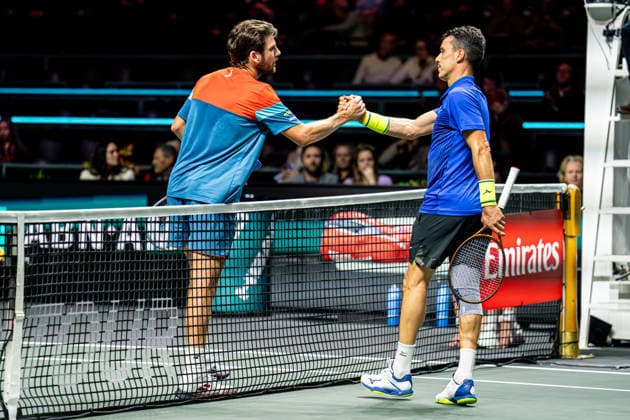 2026-02-09 ABN AMRO Open - Day One ROTTERDAM, NETHERLANDS - FEBRUARY 9: Cameron Norrie, Roberto Bautista Agut shake hands during Day One of the ABN AMRO Open at Rotterdam Ahoy on February 9, 2026 in Rotterdam, Netherlands. (Photo by Gabriel Calvino Alonso BSR Agency) Rotterdam Netherlands Content not available for redistribution in The Netherlands directly or indirectly through any third parties. Copyright: xBSRxAgencyx
