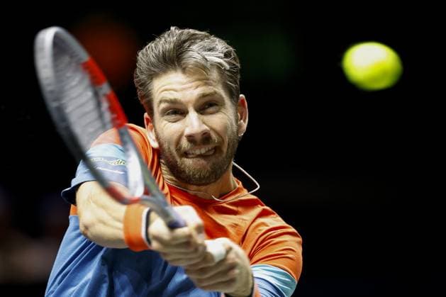 ROTTERDAM - Cameron Norrie in action against Roberto Bautista Agut on the first day of the ABN AMRO tennis tournament at Ahoy Rotterdam. BAS CZERWINSKI ANP xVIxANPxSportx xxANPxIVx 550146632 originalFilename: 550146632.jpg