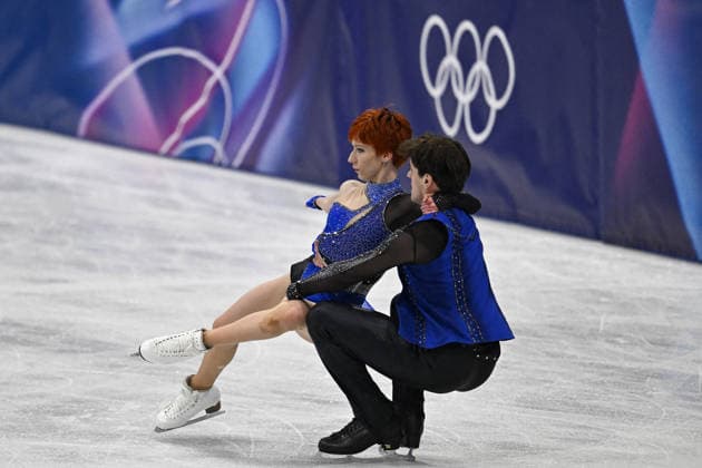 Evgeniia Lopareva And Geoffrey Brissaud At Figure skating, Eiskunstlauf Team Event Practice - Milan Evgeniia Lopareva and Geoffrey Brissaud of France during their practice of the Figure Skating Team Event at the Milano Cortina 2026 Winter Olympic Games, Olympische Spiele, Olympia, OS at Milano Ice Skating Arena on February 8, 2026 in Milan, Italy. Olivia Smart has tattoos of the olympic rings on her back. Photo by JMP ABACAPRESS.COM Milan Italy  Copyright: xJMP ABACAx