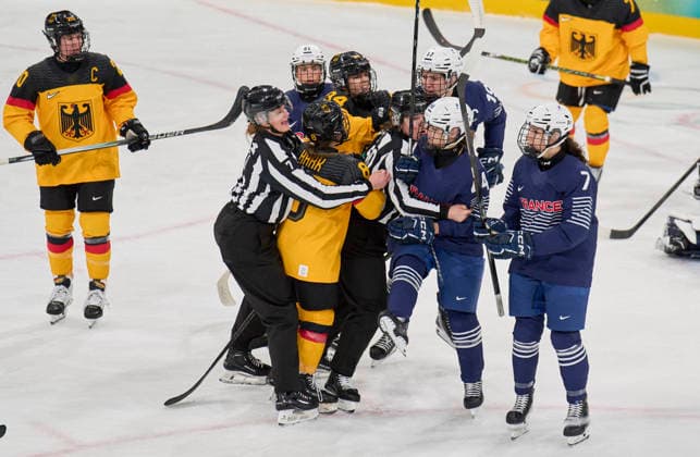 DEB fight at the preliminary women Ice hockey, Eishockey match Group B Germany - France of the Milano Cortina 2026 Winter Olympic Games, Olympische Spiele, Olympia, OS at Milano Rho Ice Hockey Arena on February 9, 2026 in Milan, Italy.