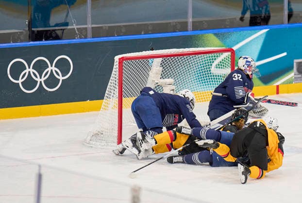 Alice Philbert of France in trouble around her goal at the preliminary women Ice hockey, Eishockey match Group B Germany - France of the Milano Cortina 2026 Winter Olympic Games, Olympische Spiele, Olympia, OS at Milano Rho Ice Hockey Arena on February 9, 2026 in Milan, Italy.
