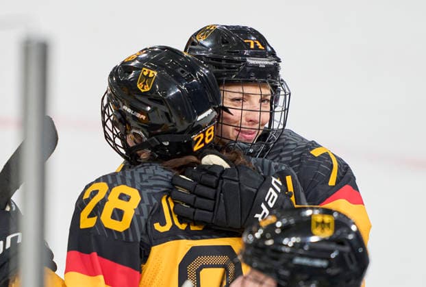 Katarina Jobst-Smith of Germany celebrates with Anne Bartsch of Germany after the preliminary women Ice hockey, Eishockey match Group B Germany - France of the Milano Cortina 2026 Winter Olympic Games, Olympische Spiele, Olympia, OS at Milano Rho Ice Hockey Arena on February 9, 2026 in Milan, Italy.