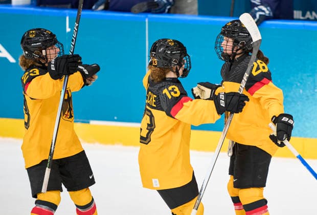 Katarina Jobst-Smith of Germany celebrates her 2-1 sudden death goal with Luisa Welke of Germany Lilli Welcke of Germany after the preliminary women Ice hockey, Eishockey match Group B Germany - France of the Milano Cortina 2026 Winter Olympic Games, Olympische Spiele, Olympia, OS at Milano Rho Ice Hockey Arena on February 9, 2026 in Milan, Italy.