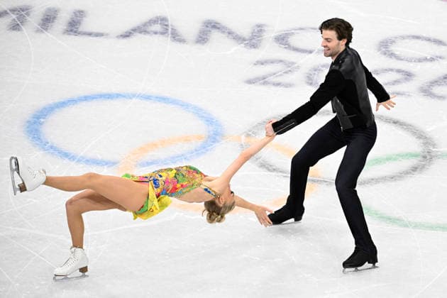 MILAN, ITALY 20260209 Ice dancers Phebe Bekker and James Hernandez, Great Britain, skate in the rhythmic dance at the Milan Ice Skating Arena during the Milan Olympics. *** Image included in the SPORTS PACKAGE. For others PAID IMAGE *** MILANO ITALY x10070x *** MILAN, ITALY 20260209 Ice dancers Phebe Bekker and James Hernandez, Great Britain, skate in the rhythmic dance at the Milan Ice Skating Arena during the Milan Olympics Image included in the SPORTS PACKAGE For others PAID IMAGE MILANO ITALY x10070x  Copyright: xJessicaxGow TTx 2026 OLYMPICS ICE DANCING