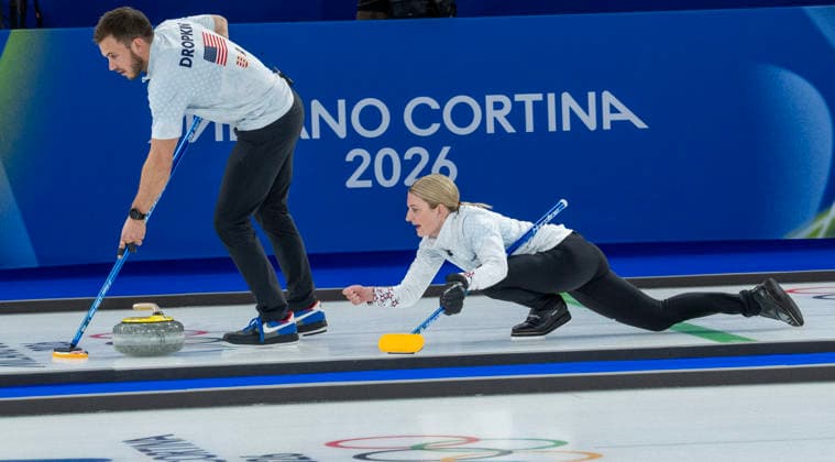February 9, 2026, Cortina D ampezzo, Belluno, Italy: Americans KOREY DROPKIN, left and CORY THIESSE of TEAM USA CURLING rduring play with team Italy on Monday February 9, 2026, Cortina d Ampezzo, Italy: Cortina D ampezzo Italy - ZUMAa35_ 20260209_oly_a35_009 Copyright: xDanielxA.xAndersonx