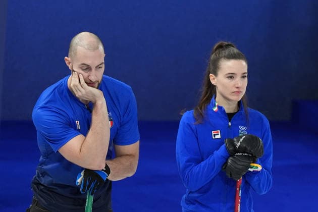 Italy s Stefania Constantini and Amos Mosaner during curling mixed doubles semi final Italy and United States at the Cortina Curling Olympic Stadium at the Milano Cortina 2026 Winter Olympics, in Cortina (Italy) February 9, 2026 (Spada LaPresse)  Copyright: xSpada LaPressex