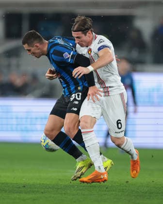 Bergamo, Italy, 9th February 2026. Federico Baschirotto of US Cremonese battles for possession with Nikola Krstovic of Atalanta during the Atalanta vs US Cremonese Serie A match at New Balance Arena, Bergamo. Picture credit should read: Jonathan Moscrop Sportimage EDITORIAL USE ONLY. No use with unauthorised audio, video, data, fixture lists, club league logos or live services. Online in-match use limited to 120 images, no video emulation. No use in betting, games or single club league player publications. SPI_048_ATALANTA_CREMONESE_ SPI-4501-0048