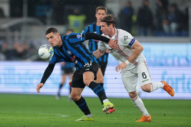 Bergamo, Italy, 9th February 2026. Federico Baschirotto of US Cremonese battles for possession with Nikola Krstovic of Atalanta during the Atalanta vs US Cremonese Serie A match at New Balance Arena, Bergamo. Picture credit should read: Jonathan Moscrop Sportimage EDITORIAL USE ONLY. No use with unauthorised audio, video, data, fixture lists, club league logos or live services. Online in-match use limited to 120 images, no video emulation. No use in betting, games or single club league player publications. SPI_054_ATALANTA_CREMONESE_ SPI-4501-0055
