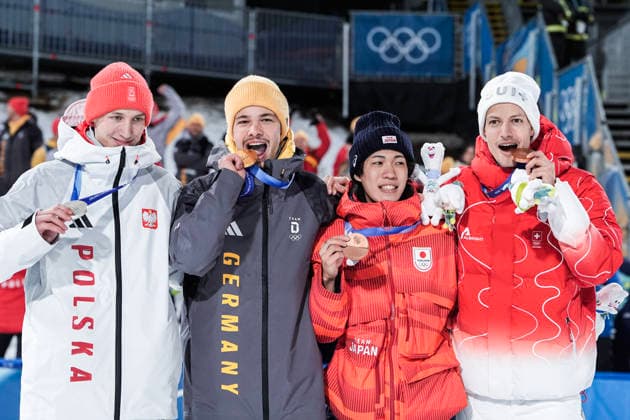Winter Olympics in Milan Cortina 2026 Val di Fiemme 20260209. Gold medalist Philipp Raimund from Germany (in the lead), silver medalist Kacper Tomasiak from Poland, and bronze medalists Ren Nikaido from Japan and Gregor Deschwanden from Switzerland during the medal ceremony for the men s individual normal hill at the Predazzo Ski jumping, Skispringen, Ski, nordisch Stadium during the Winter Olympics in Milano Cortina 2026. Photo: Terje Pedersen NTB Val di Fiemme Norway EDITORIAL USE ONLY. RESTRICTED USE FOR BETTING COMPANIES Ref:_SPO79BAQ5nyMbk.jpg *** Winter Olympics in Milan Cortina 2026 Val di Fiemme 20260209 Gold medalist Philipp Raimund from Germany in the lead , silver medalist Kacper Tomasiak from Poland, and bronze medalists Ren Nikaido from Japan and Gregor Deschwanden from Switzerland during the medal ceremony for the men s individual normal hill at the Predazzo Ski Jumping Stadium during the Winter Olympics in Milano Cortina 2026 Photo Terje Pedersen NTB Val di Fiemme Norway EDITORIAL USE ONLY RESTRICTED USE FOR BETTING COMPANIES  Copyright: xTerjexPedersenx xNTBx
