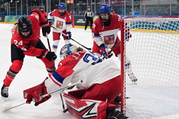 L-R Natalie Spooner (CAN), Denisa Krizova (CZE), goalkeeper Julie Pejsova (CZE) and Noemi Neubauerova (CZE) in action during the women s Ice hockey, Eishockey match of Preliminary Round, Group A: Canada vs Czechia, at the Milano Cortina 2026 Winter Olympic Games, Olympische Spiele, Olympia, OS in Milan, Italy, on February 9, 2026. (CTKxPhoto MichalxKamaryt) CTKPhotoP2026020910005  CTKPhotoP2026020910005