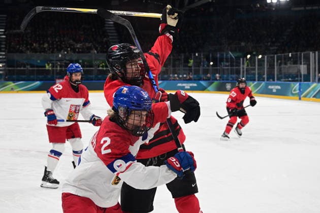 L-R Aneta Tejralova (CZE) and Brianne Jenner (CAN) in action during the women s Ice hockey, Eishockey match of Preliminary Round, Group A: Canada vs Czechia, at the Milano Cortina 2026 Winter Olympic Games, Olympische Spiele, Olympia, OS in Milan, Italy, on February 9, 2026. (CTKxPhoto MichalxKamaryt) CTKPhotoP2026020910050  CTKPhotoP2026020910050