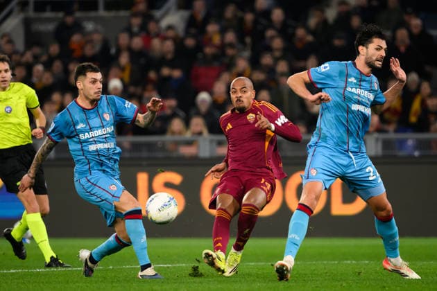 Gianluca Gaetano of Cagliari Calcio, Donyell Malen of AS Roma and Alberto Dossena of Cagliari Calcio during the Serie A 2025 2026 football match between AS Roma and Cagliari Calcio at Stadio Olimpico in Rome (Italy), February 9, 2026. AndreaxStaccioli