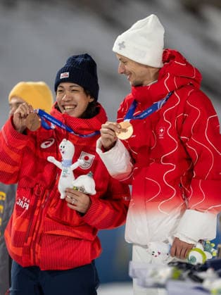 OLYMPICS - Winter Olympic Games, Olympische Spiele, Olympia, OS Milano Cortina 2026 VAL DI FIEMME,ITALY,09.FEB.26 - OLYMPICS, Ski jumping, Skispringen, Ski, nordisch - Winter Olympic Games Milano Cortina 2026, normal hill, men, individual, medal ceremony. Image shows Ren Nikaido (JPN) and Gregor Deschwanden (SUI) with their bronze medals.  GEPAxpictures xOliverxLerch